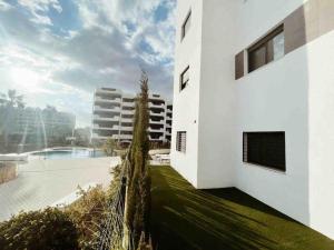 The swimming pool at or close to NEW GROUNDFLOOR APT. ARENALES DEL SOL