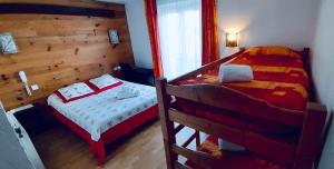 Postel nebo postele na pokoji v ubytování Hôtel Bel Angle
