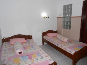Letto o letti in una camera di Fortuna Guest House