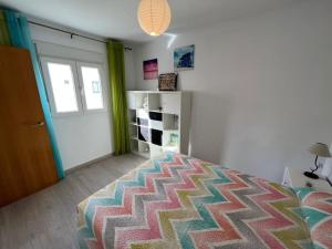 Posteľ alebo postele v izbe v ubytovaní Apartamento Bahia