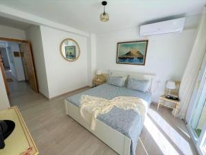 Posteľ alebo postele v izbe v ubytovaní Apartamento Bahia