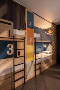 Voodi või voodid majutusasutuse Whoo Bordeaux Bacalan - Hostel toas
