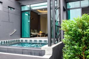 Dining and leisure area at Mangrovebay Krabi Beachfront Pool Villa, Mangrove Bay Krabi Beachfront Pool Villa