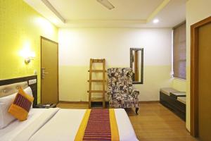 Postel nebo postele na pokoji v ubytování Hotel Aeroporto Nearest Landmark Aerocity delhi
