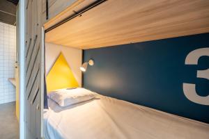 Voodi või voodid majutusasutuse Whoo Bordeaux Bacalan - Hostel toas