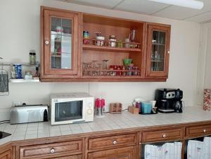 Kuchnia lub aneks kuchenny w obiekcie Maison familiale au Chenal