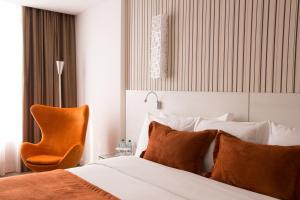 Postel nebo postele na pokoji v ubytování Radisson Hotel Curitiba