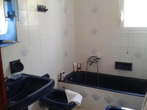 Kúpeľňa v ubytovaní Wind Villas Pounda