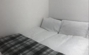 Postel nebo postele na pokoji v ubytování Macpherson House