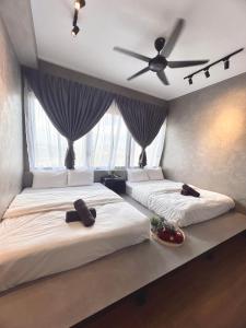 Katil atau katil-katil dalam bilik di The Apple Residences by Nestcove