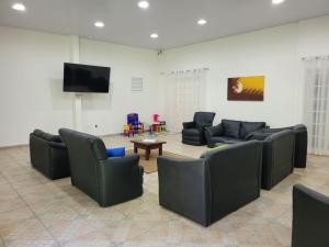 Μια τηλεόραση ή/και κέντρο ψυχαγωγίας στο Flat Amarilis Apartamento 202