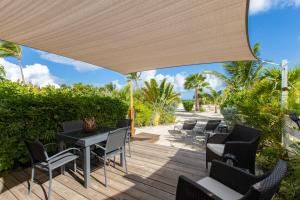 Zahrada ubytování Nettle Bay Beach Villa 2160