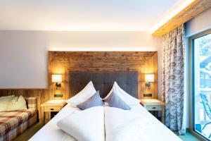 Postel nebo postele na pokoji v ubytování Hotel Glöckner und Hotel Residenz Glöckner