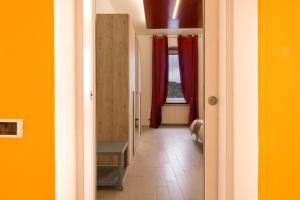 A bed or beds in a room at CIVICO 7 - Appartamento moderno e rifinito
