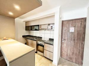 Η κουζίνα ή μικρή κουζίνα στο Don Francisco Apartamentos