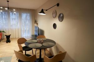 Posedenie v ubytovaní Apartament Wołodyjowskiego
