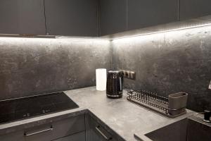 Kuchyňa alebo kuchynka v ubytovaní Apartament Wołodyjowskiego
