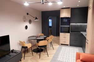 Kuchyňa alebo kuchynka v ubytovaní Apartament Wołodyjowskiego