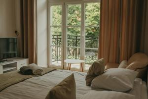 Postel nebo postele na pokoji v ubytování APARTAMENTY PRZY PARKU- Parking GRATIS!!!