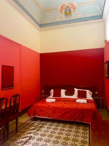 Postel nebo postele na pokoji v ubytování Hotel Valentino