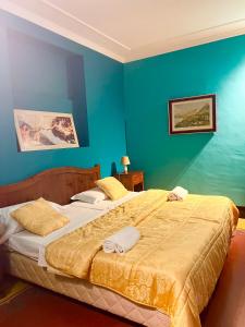 Postel nebo postele na pokoji v ubytování Hotel Valentino