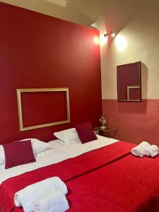 Postel nebo postele na pokoji v ubytování Hotel Valentino