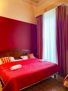 Postel nebo postele na pokoji v ubytování Hotel Valentino