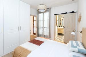 Apartamentos PROGRESO客房内的一张或多张床位