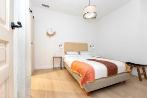 Apartamentos PROGRESO客房内的一张或多张床位