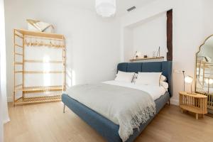 Apartamentos PROGRESO客房内的一张或多张床位