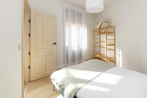 Apartamentos PROGRESO客房内的一张或多张床位