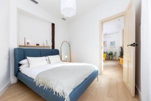 Apartamentos PROGRESO客房内的一张或多张床位