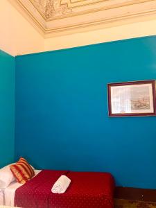 Postel nebo postele na pokoji v ubytování Hotel Valentino