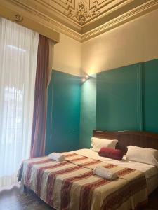 Postel nebo postele na pokoji v ubytování Hotel Valentino