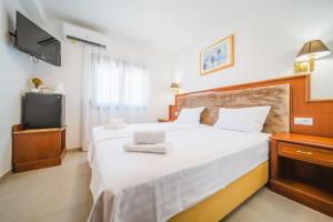 Postel nebo postele na pokoji v ubytování Pansion Lipa + 30 fotografií
