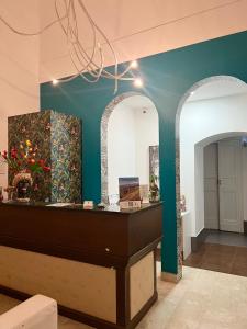 TV a/nebo společenská místnost v ubytování Hotel Valentino