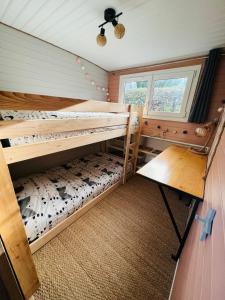 Voodi või voodid majutusasutuse Péniche Dondon - Gîte cocooning sur Canal du midi toas