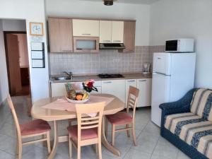 Kuchyňa alebo kuchynka v ubytovaní Guesthouse Raffaello