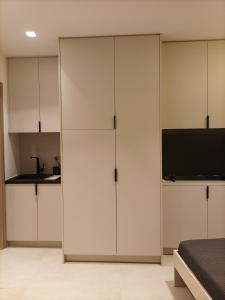 A kitchen or kitchenette at Evripidou Experience - The smart double C