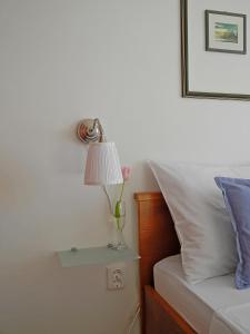 Ein Bett oder Betten in einem Zimmer der Unterkunft Apartments & Room Paula