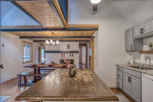 an open kitchen with a large wooden counter top at 019 - Almost Heaven in Big Bear Lake