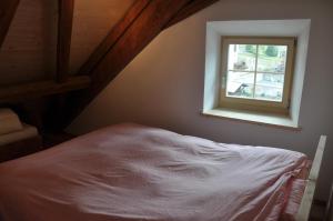 Postelja oz. postelje v sobi nastanitve Attika Wohnung 7546 Ardez