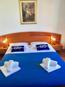 Posteľ alebo postele v izbe v ubytovaní Apartments Villa Jadranka Adults only