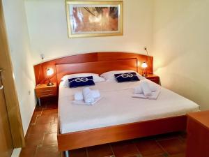 Posteľ alebo postele v izbe v ubytovaní Apartments Villa Jadranka Adults only