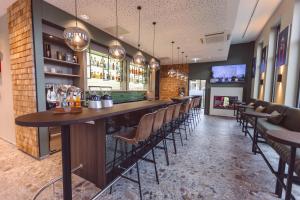 Lounge nebo bar v ubytování Hotel Libertas elements pure