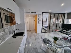 Telewizja i/lub zestaw kina domowego w obiekcie Atocha 3