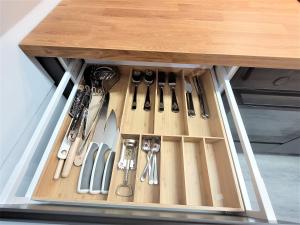 a drawer with many different kinds of tools on it at Apartament Radiostacja, dwupokojowe, parking free, klimatyzacja in Gliwice