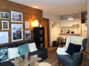 Kuchyňa alebo kuchynka v ubytovaní Appartement rez-de-chaussée, Cosy T3 4 à 6 pers avec Piscines Intérieure & Extérieure à Samoëns en Haute-Savoie