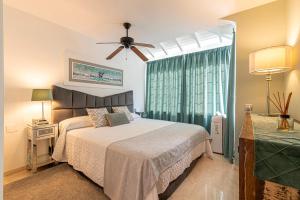 A bed or beds in a room at Apartment Terrazas La Caleta, Costa Adeje