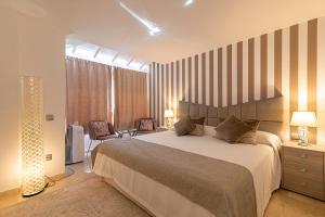 A bed or beds in a room at Apartment Terrazas La Caleta, Costa Adeje